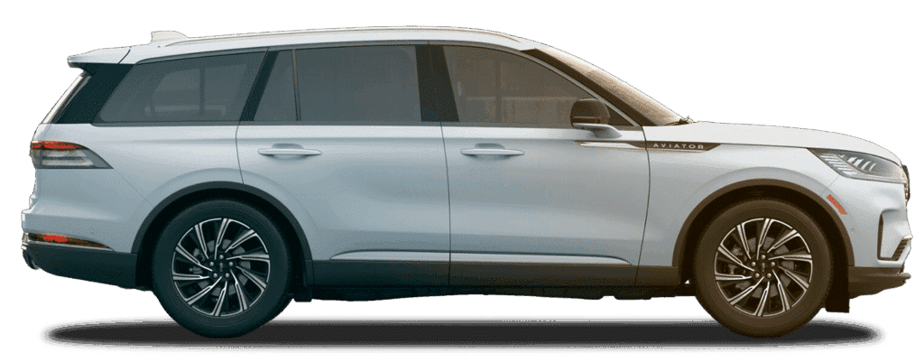 White luxury SUV, side view showing sleek design and black alloy wheels.